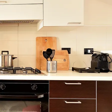 Апартаменты Attico Vista Mare E Piscina *