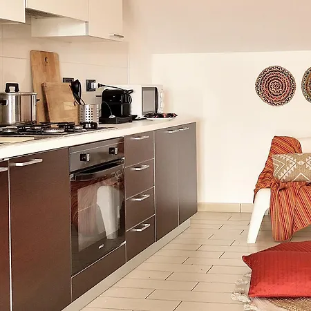 Апартаменты Attico Vista Mare E Piscina Санта-Мария-дель-Фокалло